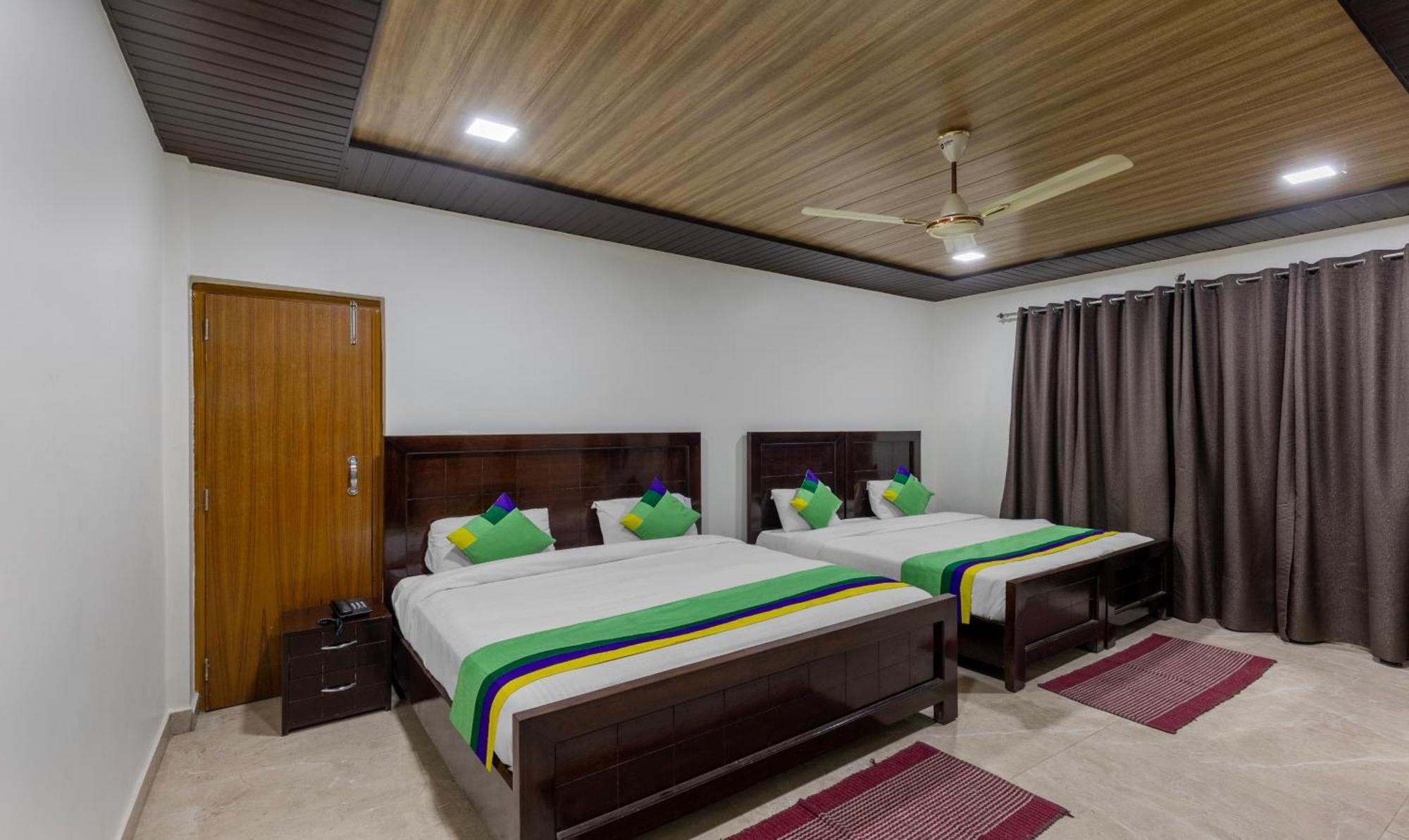 Treebo Olive Lake View Inn June Estate Bhimtal Exterior photo